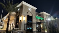 the exterior of a restaurant at night